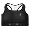Front view of the Lord and Armor Just Jesus Band sports bra in black, small white cross on the left chest and JUST JESUS across the band | Christian sports bra