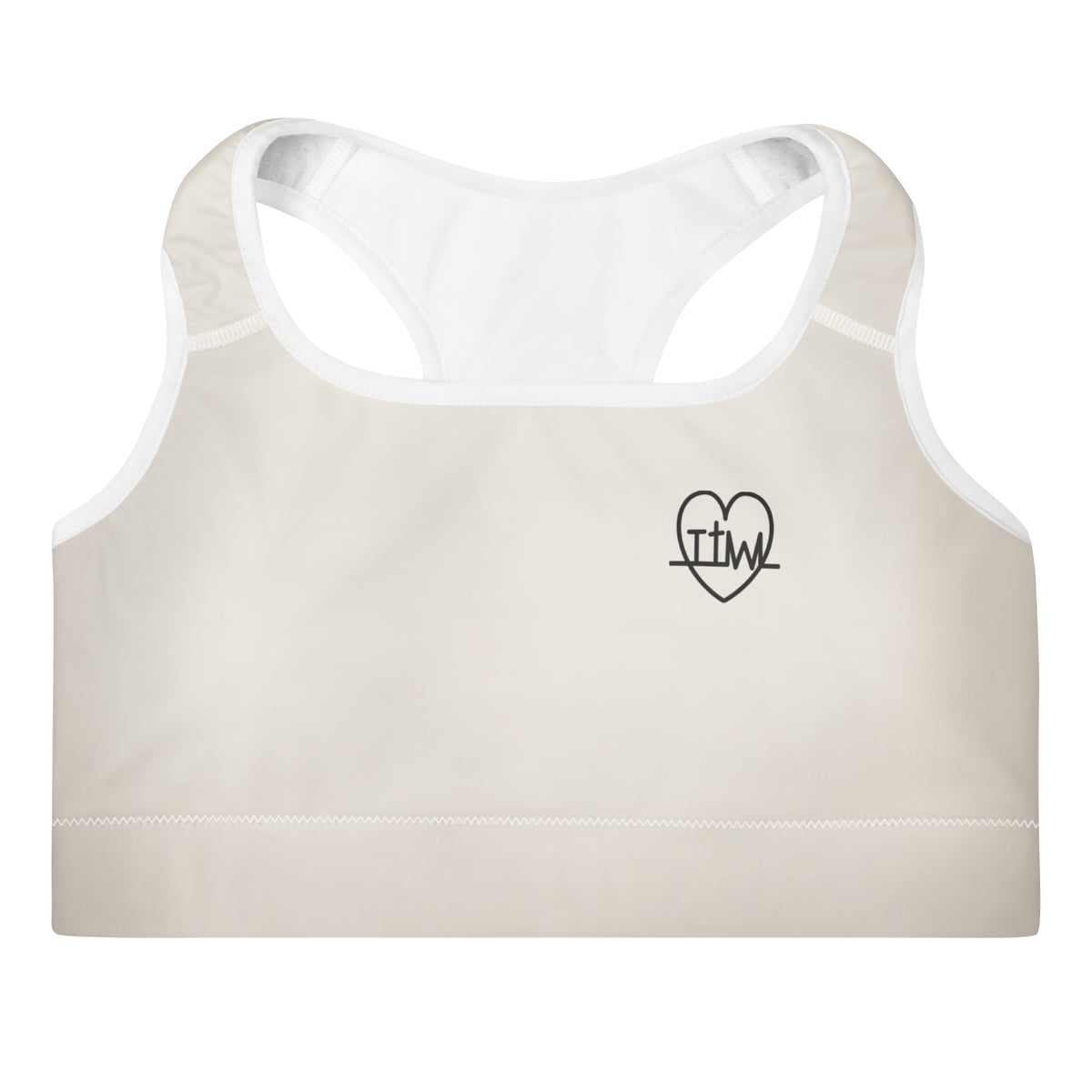 Front view of the Lord and Armor Taking the Wins Heart sports bra in cream, small black TTW heartbeat cross heart on the left chest | Christian sports bra