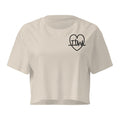 Taking the Wins heart crop top in Bone, front with small TTW heart on left chest