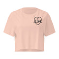 Taking the Wins heart crop top in Pale Pink, front with small TTW heart on left chest