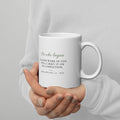 White ceramic mug with Philippians 1:6 Bible verse on the back
